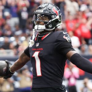 Houston Texans wide receiver Stefon Diggs (1) scores against the Jacksonville Jaguars in the first quarter at NRG Stadium.