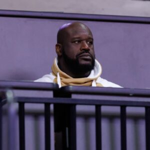 Former NBA player Shaquille O'Neal sits courtside during the first half between the Florida Gators and the LSU Tigers at Exactech Arena at the Stephen C. O'Connell Center