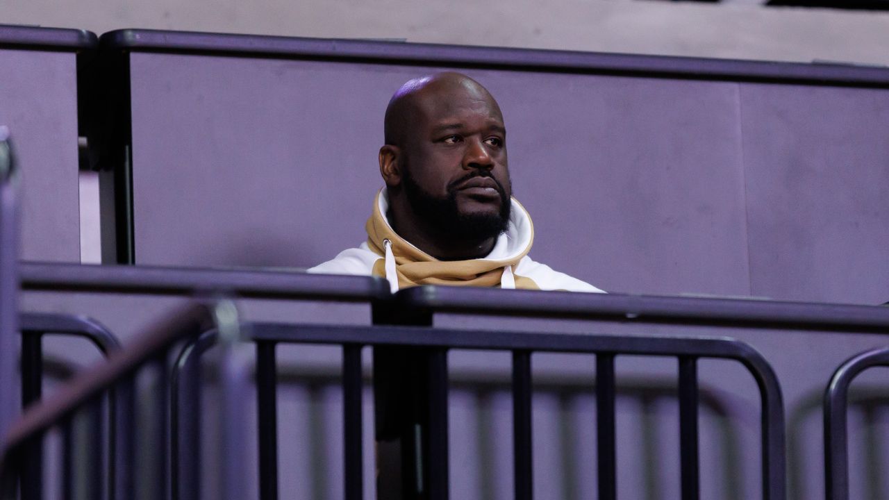 Former NBA player Shaquille O'Neal sits courtside during the first half between the Florida Gators and the LSU Tigers at Exactech Arena at the Stephen C. O'Connell Center
