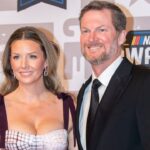 Dale Earnhardt Jr. and Amy Earnhardt pose on the red carpet for the 2023 NASCAR Awards Banquet at the Music City Center in Nashville, Tenn., Thursday, Nov. 30, 2023.