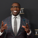 Shannon Sharpe during red carpet arrivals for the NFL Honors show