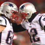 Jan 20, 2019; Kansas City, MO, USA; New England Patriots quarterback Tom Brady (12) greets center David Andrews (60) during the first half of the AFC Championship game against the Kansas City Chiefs at Arrowhead Stadium.