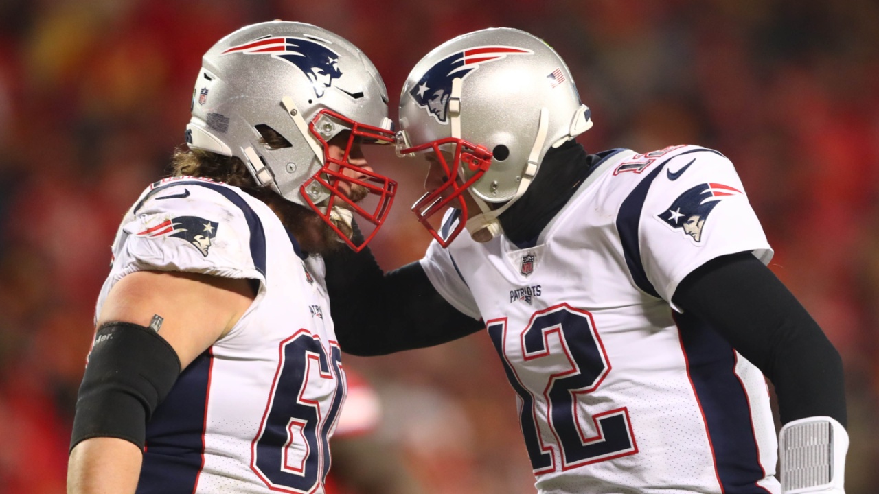 Jan 20, 2019; Kansas City, MO, USA; New England Patriots quarterback Tom Brady (12) greets center David Andrews (60) during the first half of the AFC Championship game against the Kansas City Chiefs at Arrowhead Stadium.