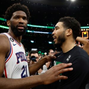 May 14, 2023; Boston, Massachusetts, USA; Boston Celtics forward Jayson Tatum (0) (right) talks with Philadelphia 76ers center Joel Embiid (21) after game seven of the 2023 NBA playoffs at TD Garden