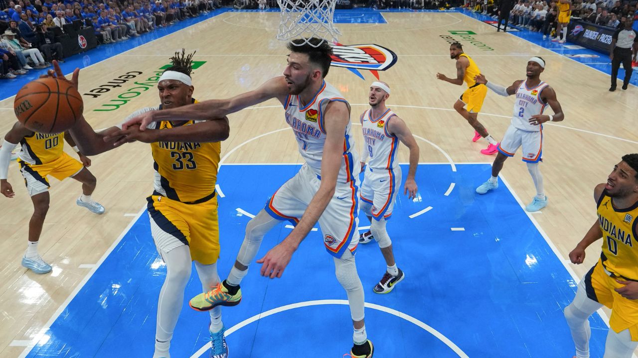 Jun 16, 2025; Oklahoma City, Oklahoma, USA; Indiana Pacers center Myles Turner (33) battles Oklahoma City Thunder forward Chet Holmgren (7) for the rebound during the first half during game five of the 2025 NBA Finals at Paycom Center. Mandatory Credit: Nate Billings/Pool Photo via Imagn Images