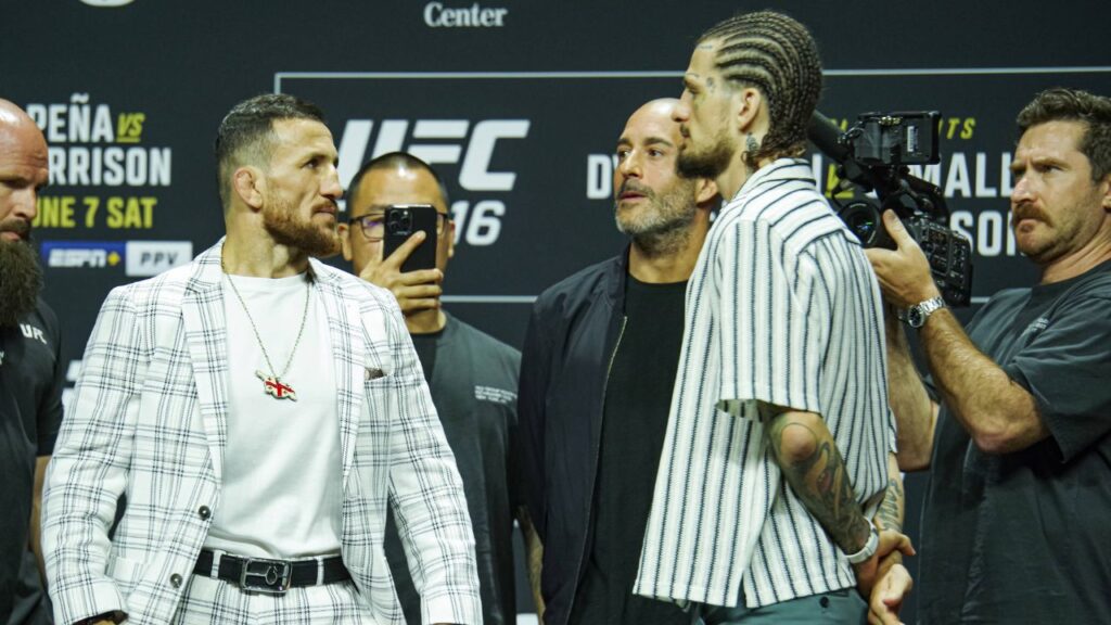 (L-R) Merab Dvalishvili and Sean O™Malley face off during the UFC 316 press conference