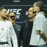 (L-R) Merab Dvalishvili and Sean O™Malley face off during the UFC 316 press conference