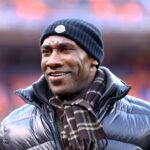 Denver Broncos former tight end Shannon Sharpe in attendance against the New England Patriots in the AFC Championship football game at Sports Authority Field at Mile High.