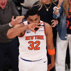 May 23, 2025; New York, New York, USA; New York Knicks center Karl-Anthony Towns (32) celebrates after scoring on a three point shot against the Indiana Pacers in the second quarter during game two of the eastern conference finals for the 2025 NBA Playoffs at Madison Square Garden