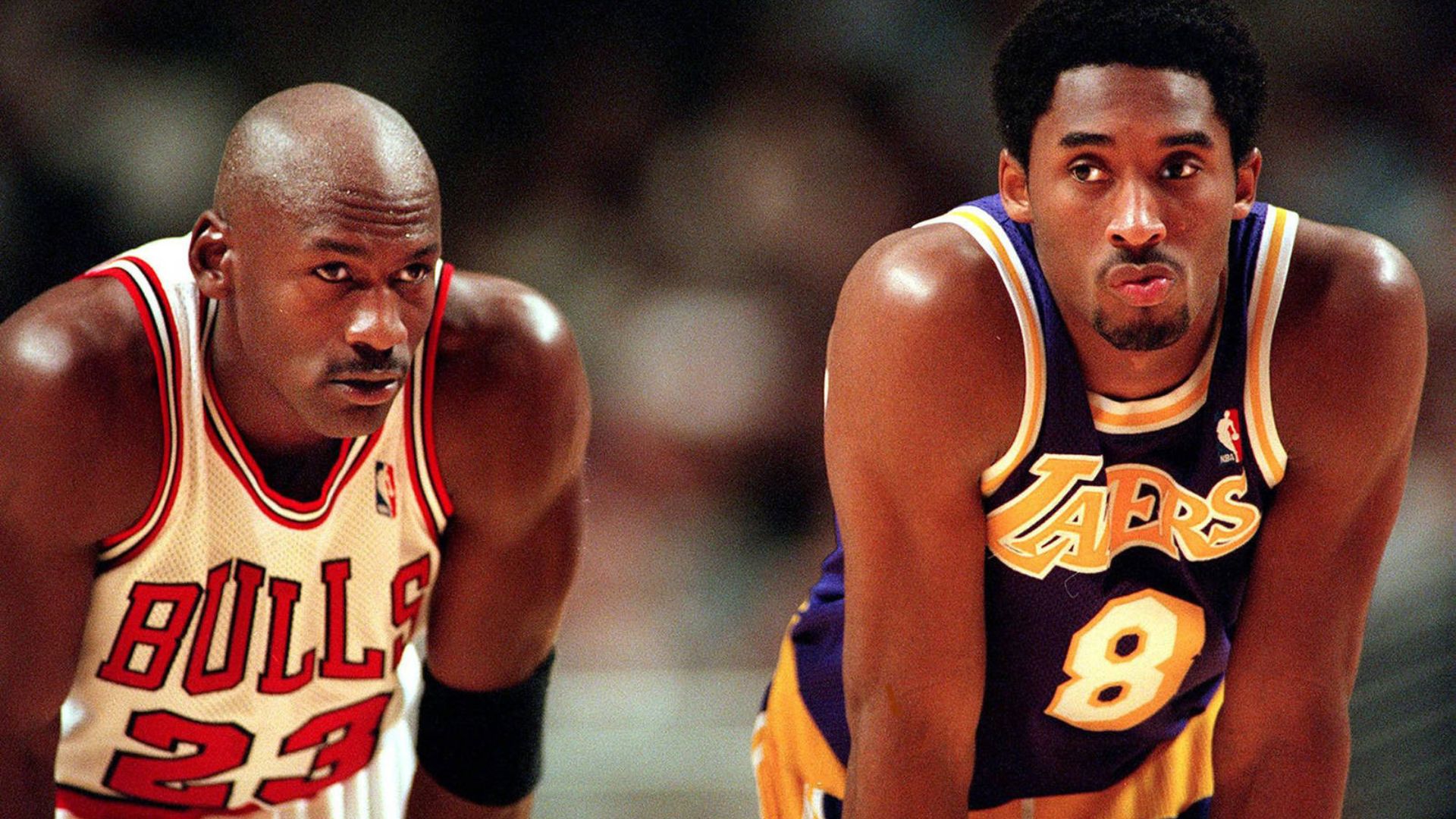Michael Jordan has a chat with the Lakers Kobe Bryant during free throws in 1997.