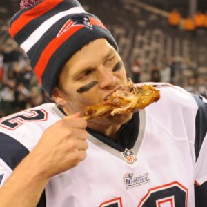 New England Patriots quarterback Tom Brady and New England Patriots strong safety Steve Gregory chow on some turkey after the win on Nov. 22, 2012 in East Rutherford, N.J. Xxx Pats Jets Rd053 Jpg S Fbn Nj
