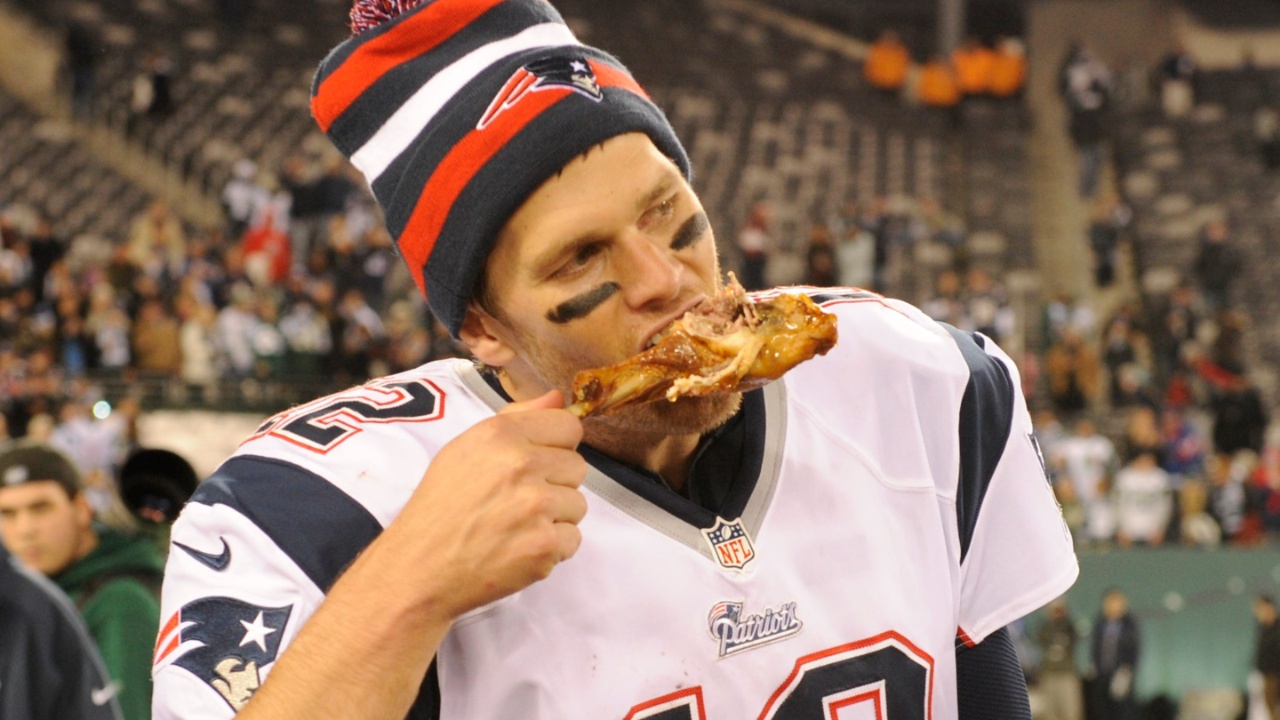 New England Patriots quarterback Tom Brady and New England Patriots strong safety Steve Gregory chow on some turkey after the win on Nov. 22, 2012 in East Rutherford, N.J. Xxx Pats Jets Rd053 Jpg S Fbn Nj