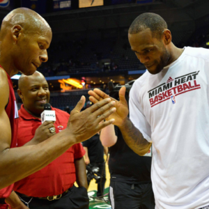 Miami Heat forward LeBron James (right) celebrates with guard Ray Allen after beating the Milwaukee Bucks 88-77