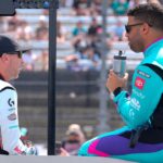 NASCAR Cup Series driver Denny Hamlin (11) chats with driver Bubba Wallace (23) during pre race intros during the Goodyear 400 at Darlington Raceway.