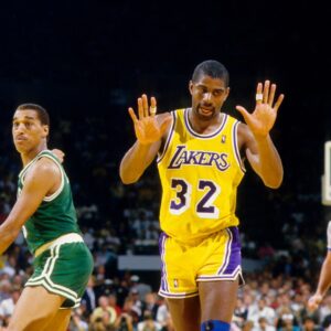 Unknown date; Los Angeles, CA, USA; FILE PHOTO; Los Angeles Lakers guard Magic Johnson (32) reacts as Boston Celtics guard Dennis Johnson points at The Forum. Mandatory