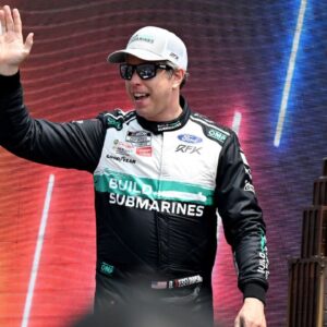 NASCAR Cup Series driver Brad Keselowski (6) greets the crowd during driver introductions before the start of the FireKeepers Casino 400 at Michigan International Speedway.