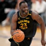 Golden State Warriors forward Draymond Green (23) dribbles the ball against the Minnesota Timberwolves in the fourth quarter during game four of the second round for the 2025 NBA Playoffs at Chase Center.