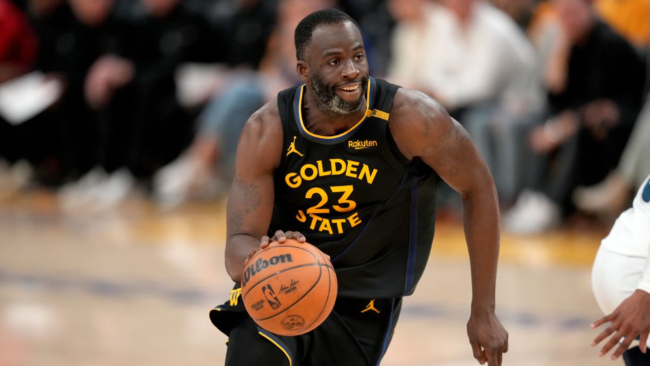 Golden State Warriors forward Draymond Green (23) dribbles the ball against the Minnesota Timberwolves in the fourth quarter during game four of the second round for the 2025 NBA Playoffs at Chase Center.