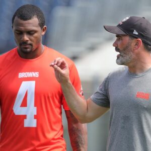 Quarterback Deshaun Watson, talking with coach Kevin Stefanski at a 2022 minicamp session, has only played in 19 of the Browns' 52 games since being acquired from the Texans in 2022.