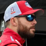 NASCAR Cup Series driver Ross Chastain looks on from behind the pit wall during practice and qualifying for The Great American Getaway 400 at Pocono Raceway.