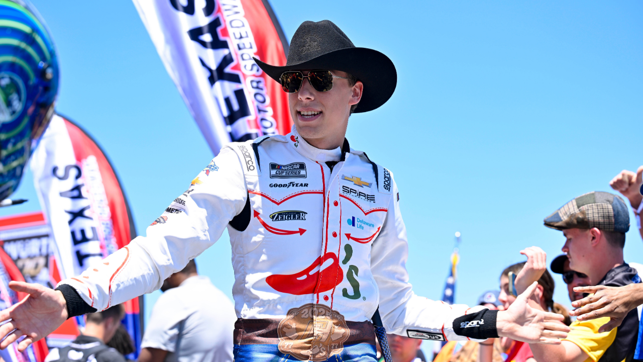 May 4, 2025; Fort Worth, Texas, USA; NASCAR Cup Series driver Carson Hocevar (77) is introduced before the start of the Wurth 400 race at Texas Motor Speedway. Mandatory Credit: Jerome Miron-Imagn Images