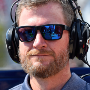 NBC analyst and former driver Dale Earnhardt Jr. looks on during practice for the 1000Bulbs.com 500 at Talladega Superspeedway.