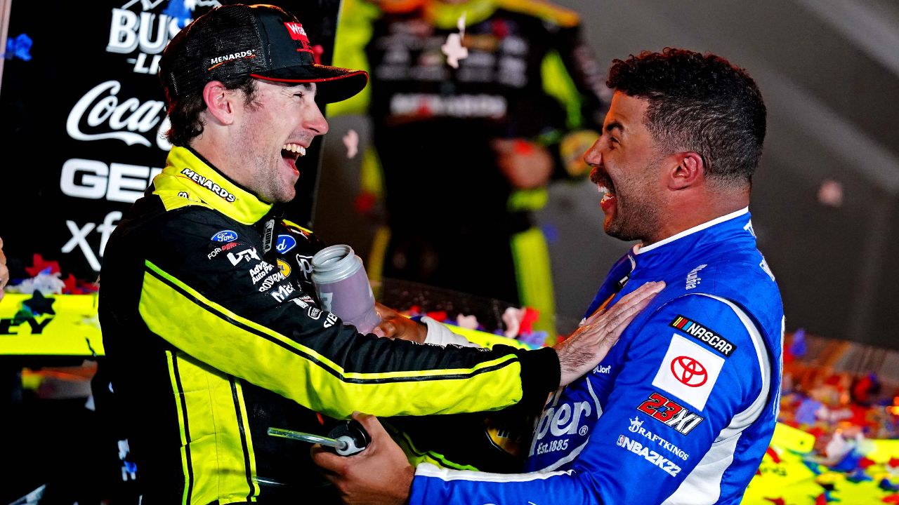 NASCAR Cup Series driver Ryan Blaney (12) celebrates in Victory lane with NASCAR Cup Series driver Bubba Wallace (23) after winning the All-Star Race at Texas Motor Speedway.