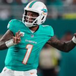 Miami Dolphins quarterback Tua Tagovailoa (1) attempts a pass against the San Francisco 49ers during second half at Hard Rock Stadium.