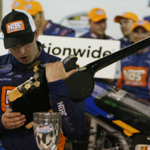 Kyle Busch smashes a Gibson guitar in Victory Lane at 14th Annual Federated Auto Parts 300 to be held June 6 at the Nashville Speedway in Gladeville, Tenn on June 6,2009.
