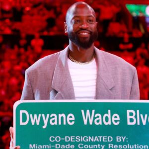 Oct 28, 2024; Miami, Florida, USA; Former Miami Heat guard Dwyane Wade is honored with 'Dwayne Wade Blvd' at halftime during a game against the Detroit Pistons at Kaseya Center. Mandatory Credit: Rhona Wise-Imagn Images