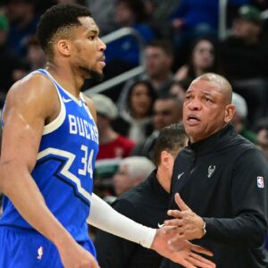 Milwaukee Bucks forward Giannis Antetokounmpo (34) walks past head coach Doc Rivers in the third quarter against the Oklahoma City Thunder at Fiserv Forum.