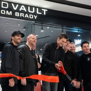 Tom Brady cuts the ribbon for the grand opening of Card Vault by Tom Brady, a sports card and memorabilia retailer at American Dream, East Rutherford, Friday, Apr. 11, 2025.