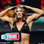 Kayla Harrison steps on the scale for the ceremonial weigh-ins at the Salt Palace Convention Center for UFC307