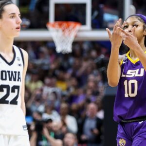 Apr 2, 2023; Dallas, TX, USA; LSU Lady Tigers forward Angel Reese (10) gestures towards Iowa Hawkeyes guard Caitlin Clark (22) after the final round of the Women's Final Four NCAA tournament at the American Airlines Center.