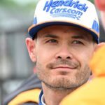 Arrow McLaren driver Kyle Larson (17) is seen talking in the garage area after a crash on Lap 91 on Sunday, May 25, 2025, during the 109th running of the Indianapolis 500 at Indianapolis Motor Speedway.