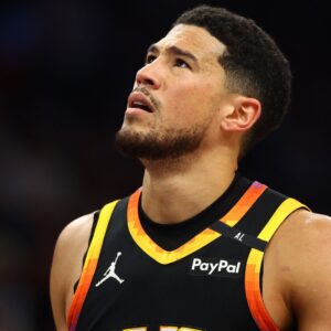 Apr 9, 2025; Phoenix, Arizona, USA; Phoenix Suns guard Devin Booker (1) reacts after a play against the Oklahoma City Thunder during the first half at Footprint Center. | Credits- Mark J. Rebilas-Imagn Images