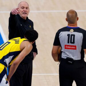 Jun 16, 2025; Oklahoma City, Oklahoma, USA; Indiana Pacers head coach Rick Carlisle motions to the bench as guard Tyrese Haliburton (0) looks on in the first quarter against the Oklahoma City Thunder during game five of the 2025 NBA Finals at Paycom Center. Mandatory Credit: Alonzo Adams-Imagn Images