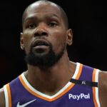Mar 26, 2025; Phoenix, Arizona, USA; Phoenix Suns forward Kevin Durant (35) looks on against the Boston Celtics during the second half at Footprint Center