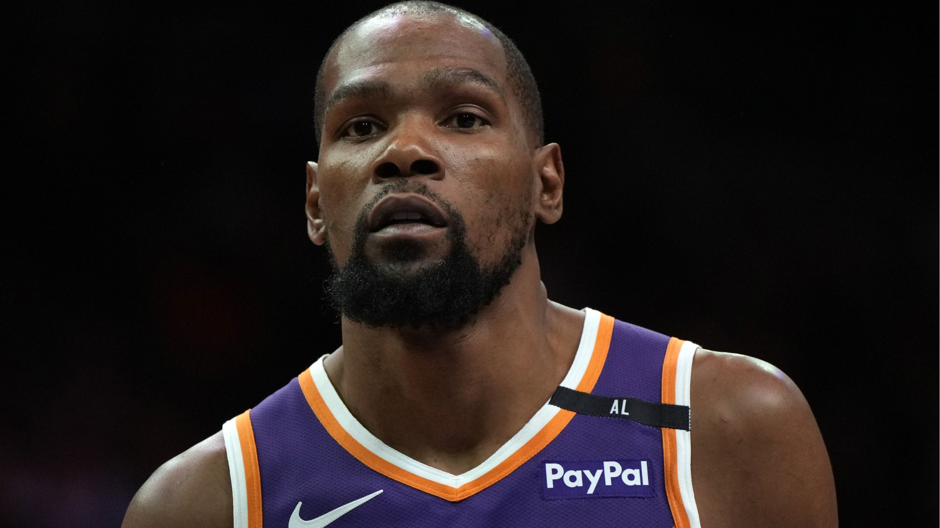 Mar 26, 2025; Phoenix, Arizona, USA; Phoenix Suns forward Kevin Durant (35) looks on against the Boston Celtics during the second half at Footprint Center