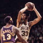 Dec 1970; USA; FILE PHOTO; Milwaukee Bucks center Kareem Abdul-Jabbar (33) against Los Angeles Lakers center Wilt Chamberlain (13).