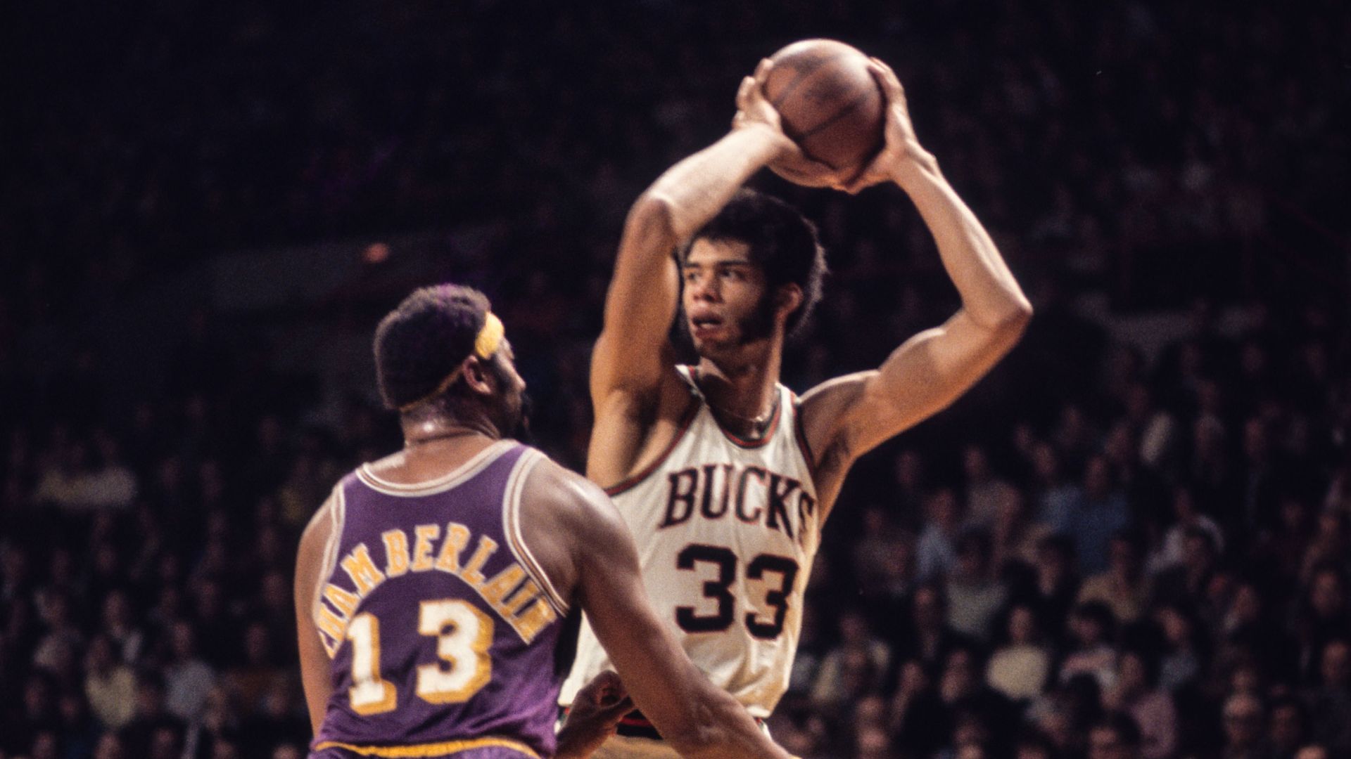 Dec 1970; USA; FILE PHOTO; Milwaukee Bucks center Kareem Abdul-Jabbar (33) against Los Angeles Lakers center Wilt Chamberlain (13).