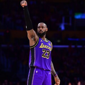 Jan 3, 2025; Los Angeles, California, USA; Los Angeles Lakers forward LeBron James (23) reacts after scoring three point basket against the Atlanta Hawks during the second half at Crypto.com Arena