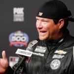 NASCAR Cup Series driver BJ McLeod (78) speaks with reporters during media day at Daytona International Speedway.