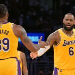 Los Angeles Lakers center Dwight Howard (39) is met by Los Angeles Lakers forward LeBron James (6) in the first half of the game against the Utah Jazz at Crypto.com Arena.