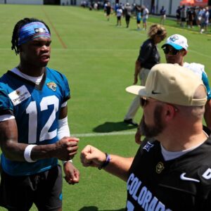 Jacksonville Jaguars wide receiver Travis Hunter (12) greets fans during the second mandatory minicamp at Miller Electric Center Wednesday, June 11, 2025 in Jacksonville, Fla.