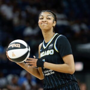 Jun 17, 2025; Chicago, Illinois, USA; Chicago Sky forward Angel Reese (5) looks to pass the ball against the Washington Mystics during the first half of a WNBA game at Wintrust Arena. Mandatory Credit: Kamil Krzaczynski-Imagn Images