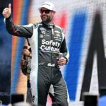 NASCAR Cup Series driver Shane van Gisbergen (88) greets the crowd during driver introductions before the start of the FireKeepers Casino 400 at Michigan International Speedway.