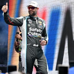 NASCAR Cup Series driver Shane van Gisbergen (88) greets the crowd during driver introductions before the start of the FireKeepers Casino 400 at Michigan International Speedway.