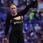 Ronda Rousey celebrates after winning the women s Royal Rumble match during the Royal Rumble at The Dome at America's Center.