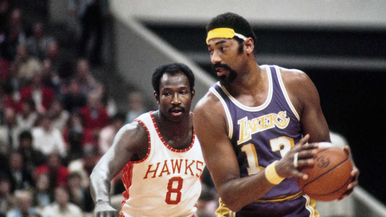 Los Angeles Lakers center Wilt Chamberlain (13) is defended by Atlanta Hawks center Walt Bellamy (8) during the 1972-73 season at The Omni